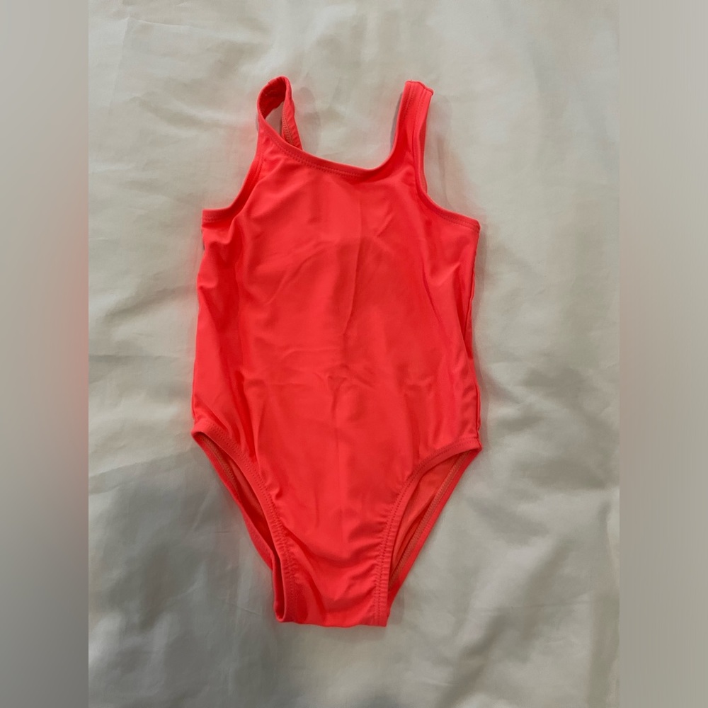 Cute swimsuit by Old Navy in size 2T! Bright orange one piece in great condition